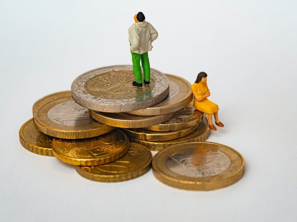 UKDS blog the biggest credit myths debunked characters standing on coins