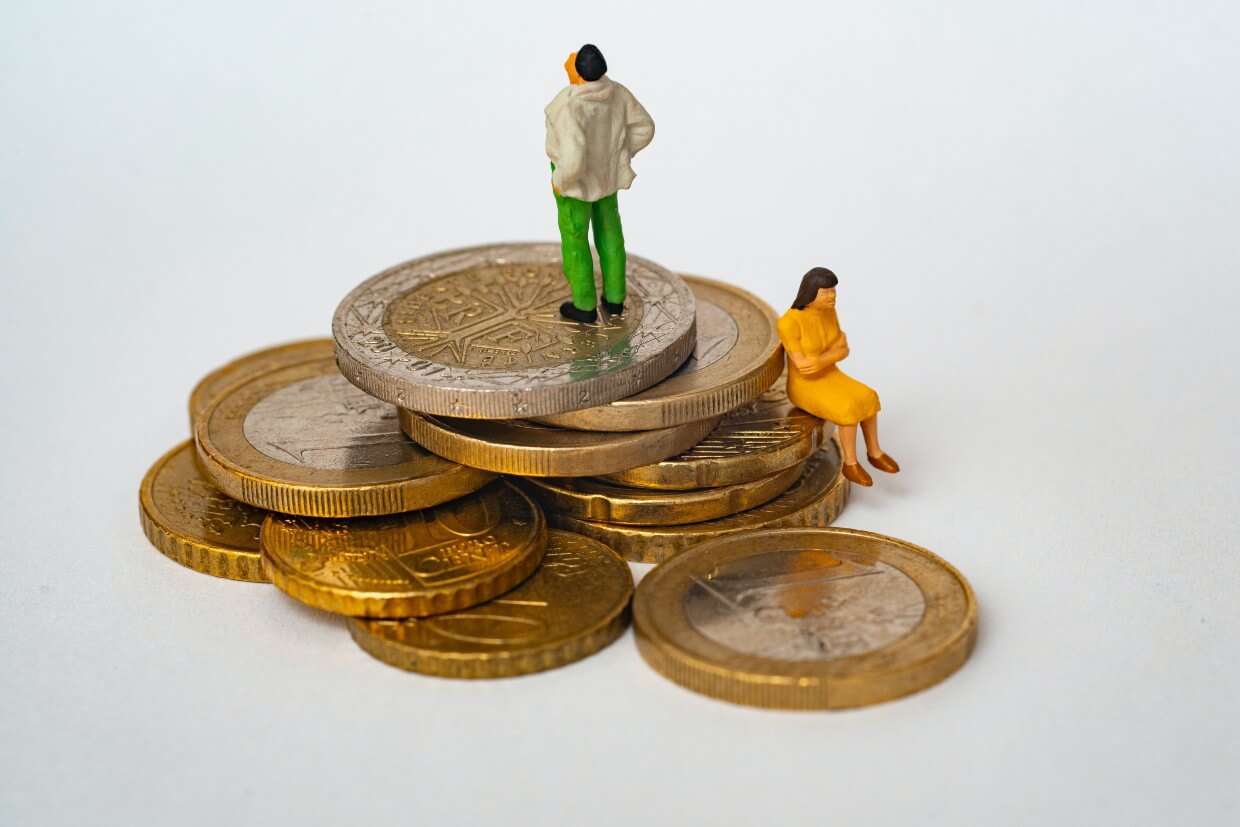 UKDS blog the biggest credit myths debunked characters standing on coins